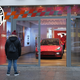 A man in Berlin stares at the Model 3.